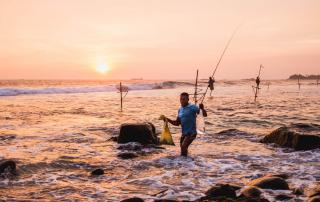 Pescadores ao por-do-sol