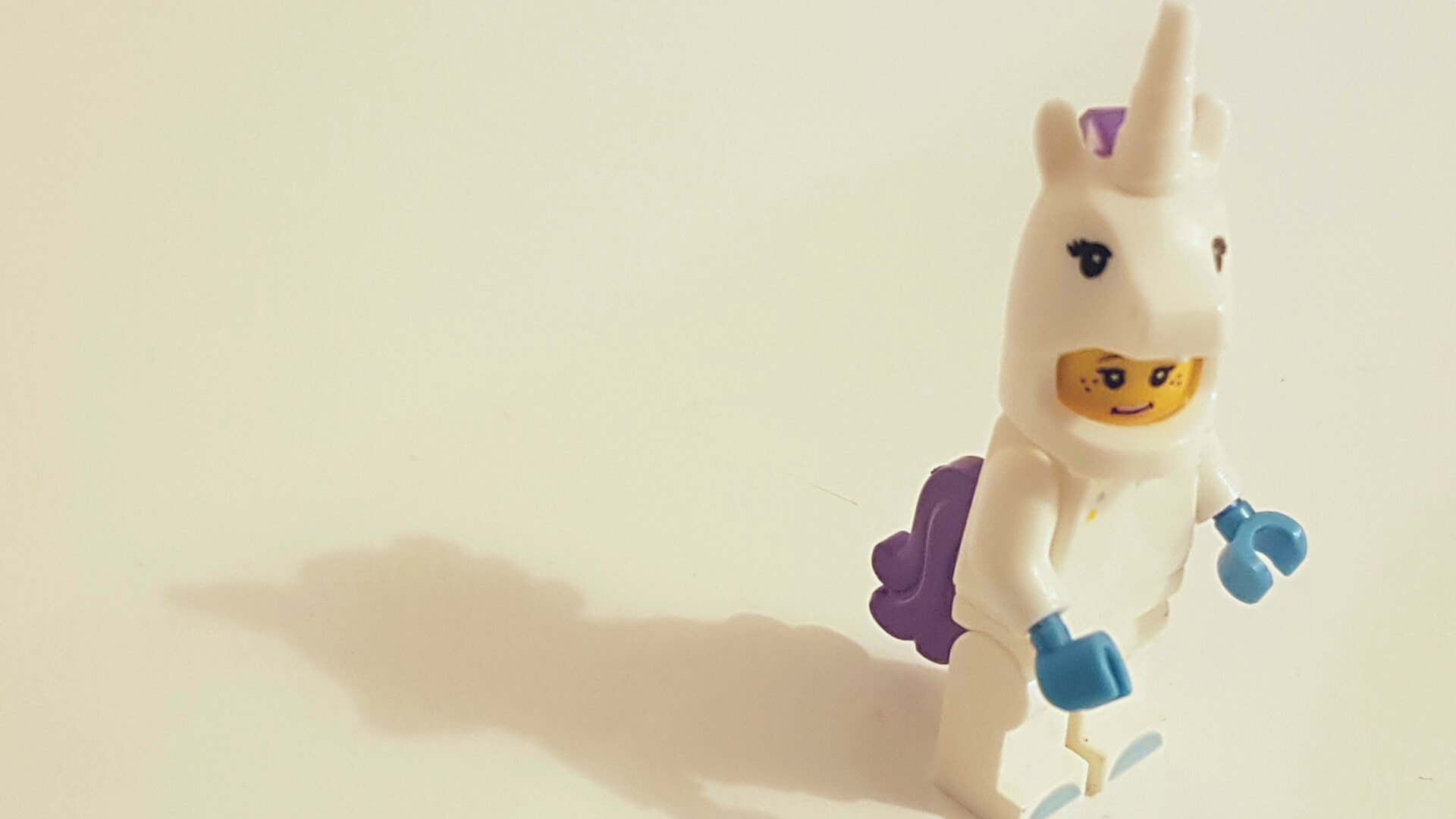 lego figure dresses as unicorn