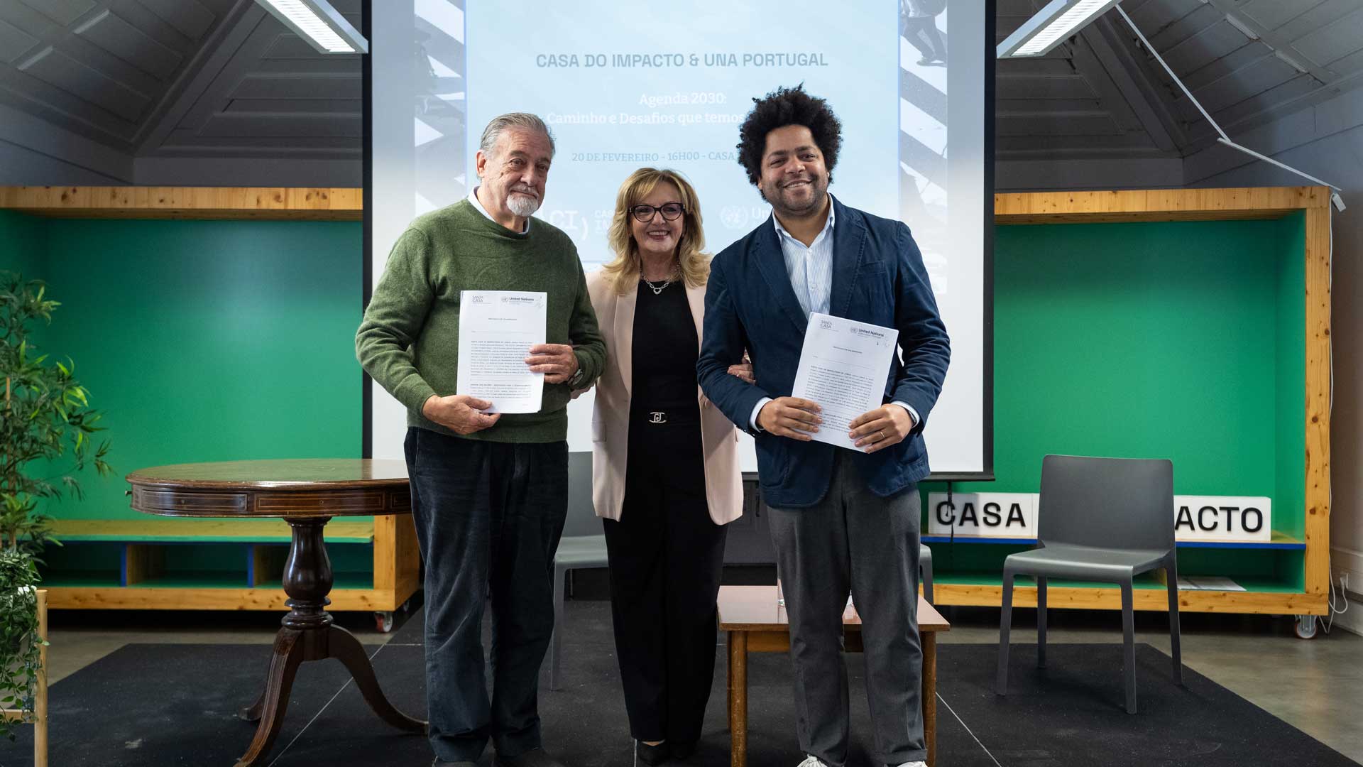 Representantes da UNA Portugal e Nuno Comando da Casa do Impacto